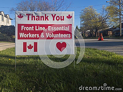 Thank you front line, essential workers & volunteers sign in front of a house during corona virus pandemic outbreak Stock Photo