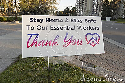 Thank you front line, essential workers & volunteers sign in front of a house during corona virus pandemic outbreak Stock Photo