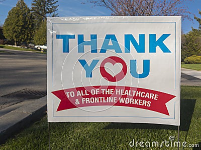 Thank you front line, essential workers & volunteers sign in front of a house during corona virus pandemic outbreak Stock Photo