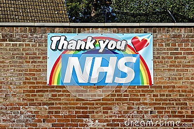 A Thank You NHS banner attached to a brick wall Editorial Stock Photo