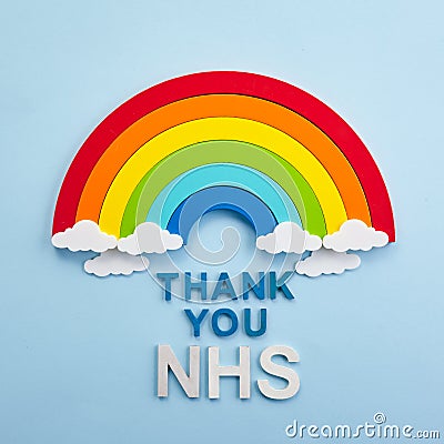 Thank you nhs rainbow banner. Rainbow ob blue background with letters Stock Photo