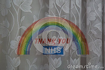 A thank you NHS rainbow sticker on the window of a home during the coronavirus pandemic Editorial Stock Photo