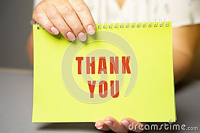 Thank you on notes in female hands. Expressing gratitude, acknowledgment or appreciation concept. Gratitude and appreciation. Stock Photo