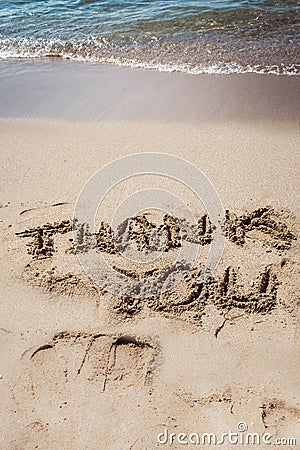 Thank You, text on sand at beach Stock Photo