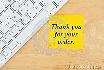 Thank you for your order text on a sticky note with a keyboard Stock Photo