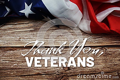 Thank Your Veterans message with American flag on wooden background Stock Photo