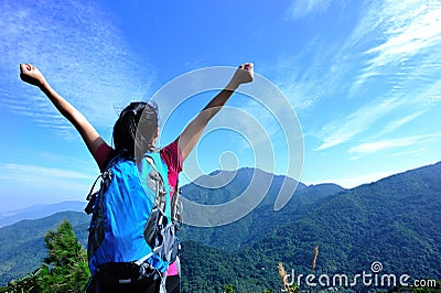 Thankful woman climber Stock Photo
