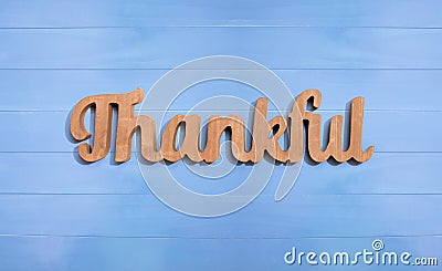 Thankful wooden text from above Stock Photo