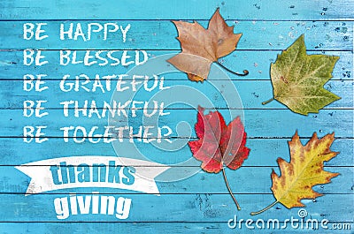 Thanks giving greeting poster card with four leaf on blue wood Stock Photo