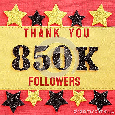 Thanks 850K, 850000 followers. message with black shiny numbers on red and gold background with black and golden shiny stars Stock Photo