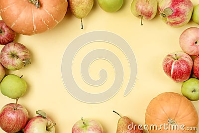 Thanksgiving Background Apples Pumpkins on Yellow Background Copy Space For Text Frame Horizontal Halloween Thanksgiving day or Stock Photo