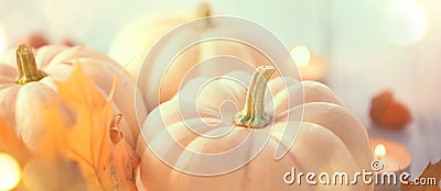 Thanksgiving background. Holiday scene. Wooden table, decorated with pumpkins, autumn leaves Stock Photo