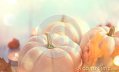 Thanksgiving background. Holiday scene. Wooden table, decorated with pumpkins, autumn leaves Stock Photo