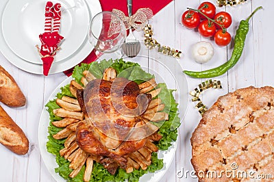 Homemade roasted whole turkey on wooden table for Thanksgiving. Stock Photo