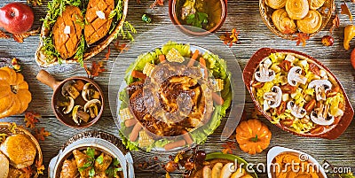 Thanksgiving dinner setting on rustic wooden table Stock Photo