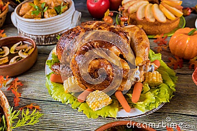 Thanksgiving dinner with turkey, apple pie, pumpkin Stock Photo