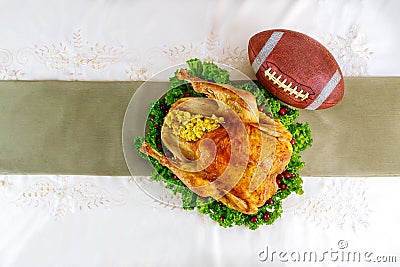 Thanksgiving football game concept. Festive turkey with garnish Stock Photo