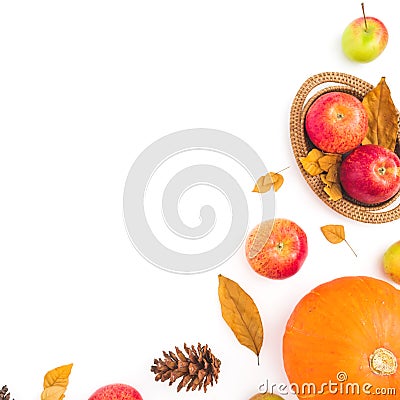 Thanksgiving frame made of fall dried leaves, pine cones, apples and pumpkin on white background. Flat lay, top view. Autumn compo Stock Photo
