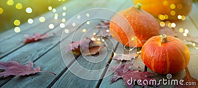 Thanksgiving holiday party background, autumn pumpkin and holidays light decoration Stock Photo