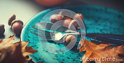 Thanksgiving holiday table served. Wooden table decorated with autumn leaves Stock Photo