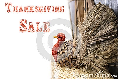 Thanksgiving turkey made out of pinecone and burlap and straw at side of white background - selective focus - Thanksgiving sale Stock Photo