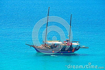 THASSOS, GREECE - SEPTEMBER 05 2016 - Tourists on old sailing ship in Thassos, Greece Editorial Stock Photo