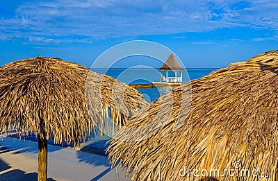 Umbrellas on Tropical Beach Stock Photo