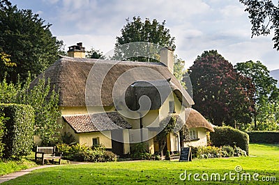 A thatched cottage in the village of Selworthy in Somerset Editorial Stock Photo