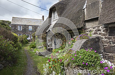 Thatched cottages at Cadgwith Cove, Cornwall, England Stock Photo