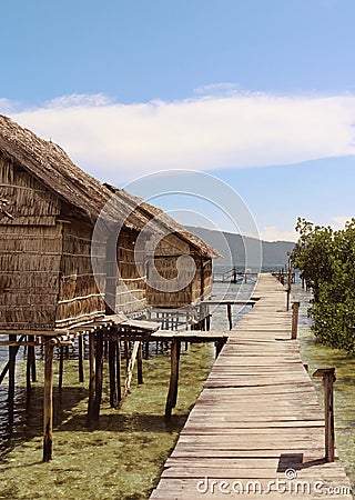 Thatched Hut on a Pier in Gam Islands, Raja Ampat Stock Photo