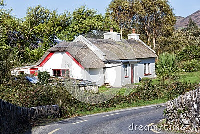 Traditional Roadside Thatched Cottage in kerry Stock Photo