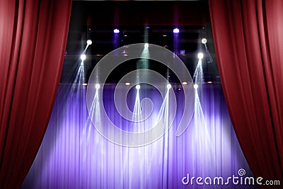 Theater stage red curtains opening for a live performance Stock Photo
