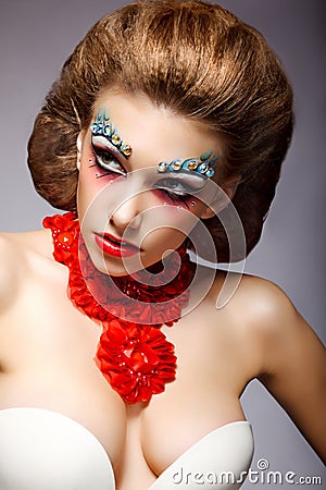 Theatre. Classy Woman with Fantastic Stagy Colorful Makeup. Fantasy Stock Photo