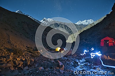 On their way to the base camps of the mountains above 6-8000m, porters and climbers set up intermediate camps Editorial Stock Photo