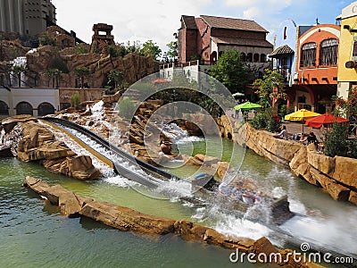 Log flume ride splash zone family fun in Mexican setting Editorial Stock Photo