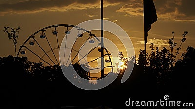 Wheel at sunset Stock Photo