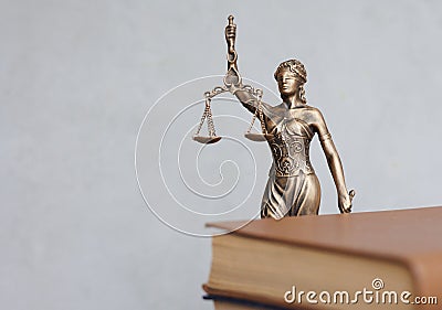 themis goddess of justice statuette, symbol of law with scales and sword in his hands Stock Photo