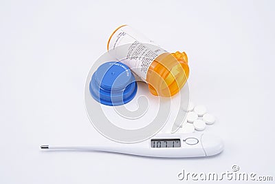 Themometer and drugs Stock Photo