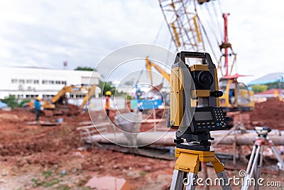 Theodolite equipment of Surveyor builder engineer during surveying work in construction site Stock Photo