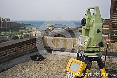 Theodolite on the rooftop Stock Photo