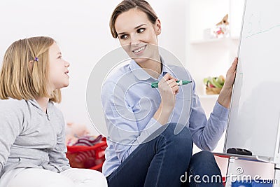 Therapist working with ADHD girl Stock Photo