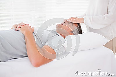 Therapist working with man Stock Photo