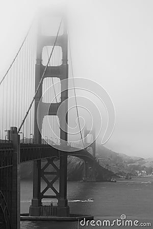 Golden Gate Bridge Blanketed by the Rolling Clouds Stock Photo