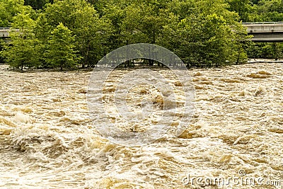 Whitecaps and Whirlpools Can Be Seen in a Turbulent River after Heavy Rains. Stock Photo