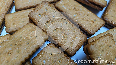 there are lots of chocolate biscuits with granulated sugar sprinkled on top Stock Photo