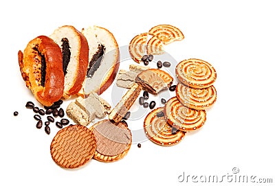 There are Pieces of Roll with poppyseed,Cookies,Halavah,Chocolate Peas,Tasty Sweet Food on the White Background,Top View Stock Photo