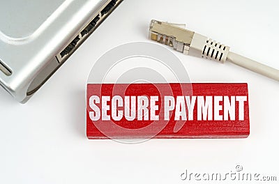 There is a router on the table, disconnected from the network, next to a plaque with the inscription - secure payment Stock Photo