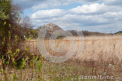 There is waste heap in middle of autumn steppe Stock Photo