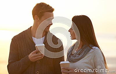 Theres nothing like young love. a young woman at the beach. Stock Photo