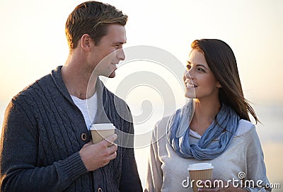 Theres nothing like young love. a young woman at the beach. Stock Photo